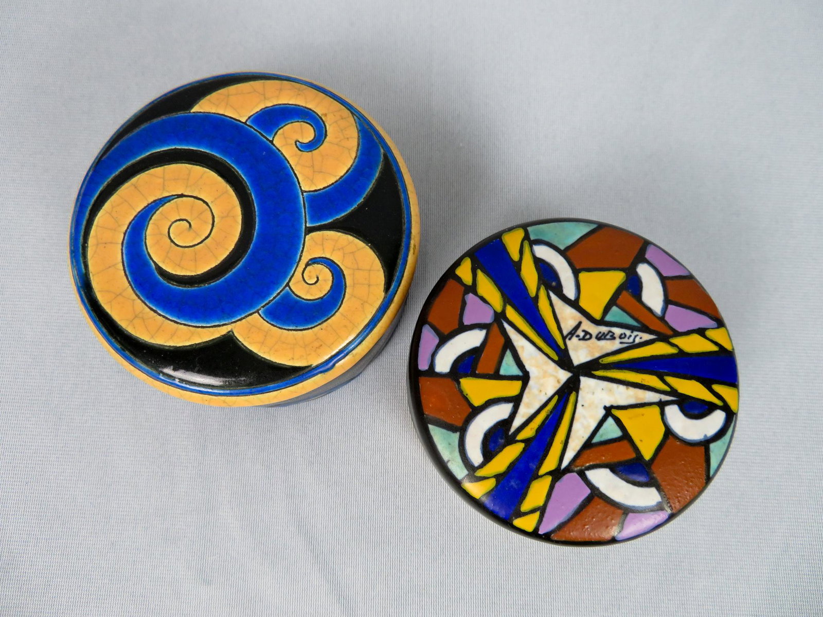 Continental Art Deco Faience Lidded Powder Dresser Jars: Makers: Emaux de Longwy & Antoine DuBois Location of Manufacture: France & Belgium Period of Manufacture: c.1925 Materials: Faience Porcelain Dimensions of Longwy Box: 4 1/4" diameter ; 2"(h) Weight o