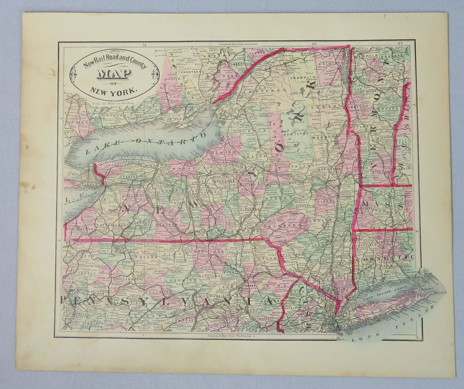 c.1880 New Railroad and County Map of New York: Image Type: Hand Colored Engraving Scale: 36 miles to 1 inch>br>Dimensions: 13 3/4"(l) x 11 1/2"(w) For your consideration is a hand-colored engraved railroad and county map of New York. This highly d