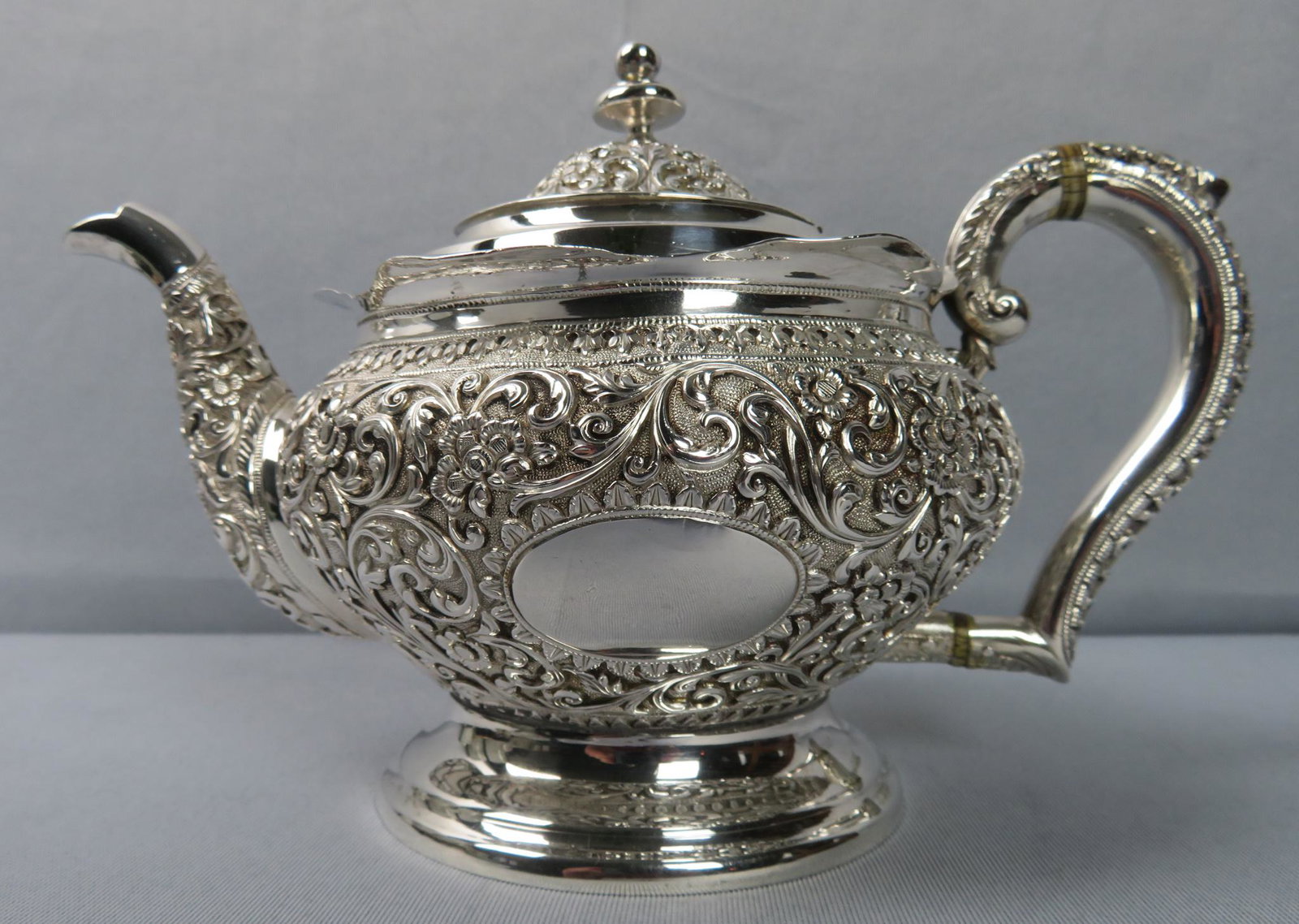 British Colonial Indian Sterling Silver Kutch The items: Location of Manufacture: Kutch, British Colonial India Period of Manufacture: Raj Period (1858-1947) Materials: Sterling Silver Dimensions: 9 1/2" handle to spout ; 5 3/4"(h) x 5"(w) Weight: 1 lbs. 4.