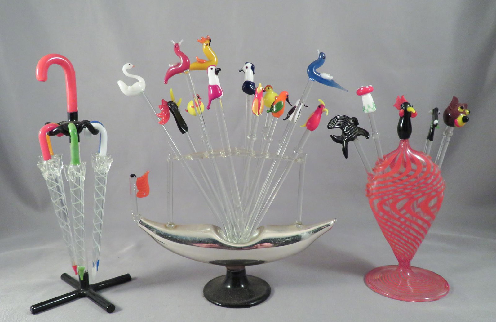 Bimini Austrian Blown Glass Figural Cocktail Pick Sets: Manufacturer: Bimini Glass Designer: Walter Lampl Location of Manufacture: Vienna, Austria Period of Manufacture: 1st Half of 20th Century Gondola Dimensions: 5"(w) ; 1 5/8" base diameter Striped Pick