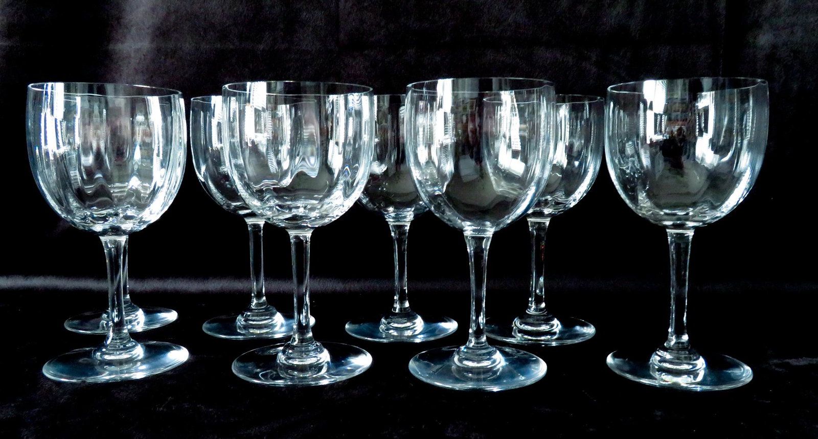 (8) Baccarat Montaigne Optic Water or Wine Glasses: Manufacturer: Baccarat Crystal Pattern: Montaigne Optic Location of Manufacture: Baccarat, France Period of Manufacture: c.1980 Dimensions (each): 6 3/8"(h) ; 3 1/4" rim diameterWeight of Lot: 3 lbs. 