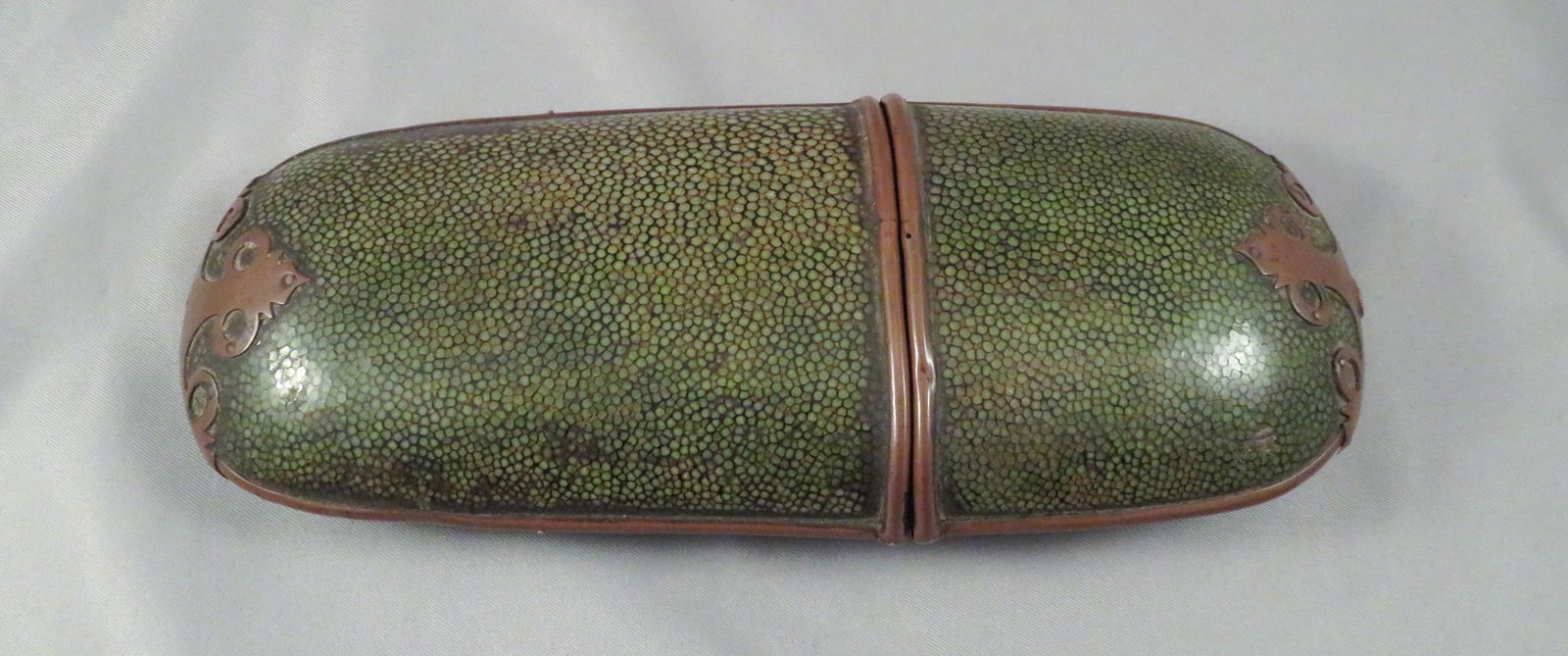 Chinese Green Shagreen Eye Glasses Case Copper Details: Location of Manufacture: China Period of Manufacture: Qing Dynasty c.1860 Materials: Shagreen (Shark/Stingray Skin) & Copper Dimensions: 7"(l) x 3"(w) x 1"(d) Weight: 3 ounces For your consideration i
