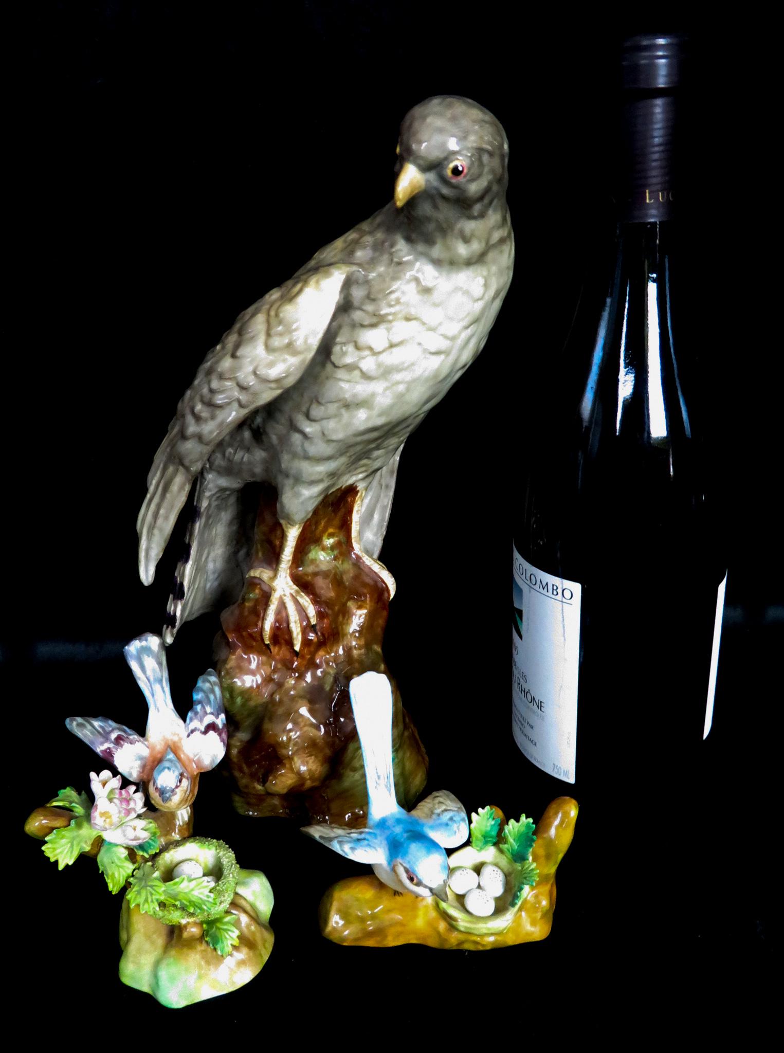 (3) Crown Staffordshire Fine Bone Porcelain Birds Jones: Manufacturer: Crown Staffordshire Designer: J. T. Jones Period of Manufacture: First Half of 20th Century Dimensions of Hawk/Falcon: 11"(h) Dimensions of Finch: 4 3/4"(h) Dimensions of Wren: 3 5/8"(h)