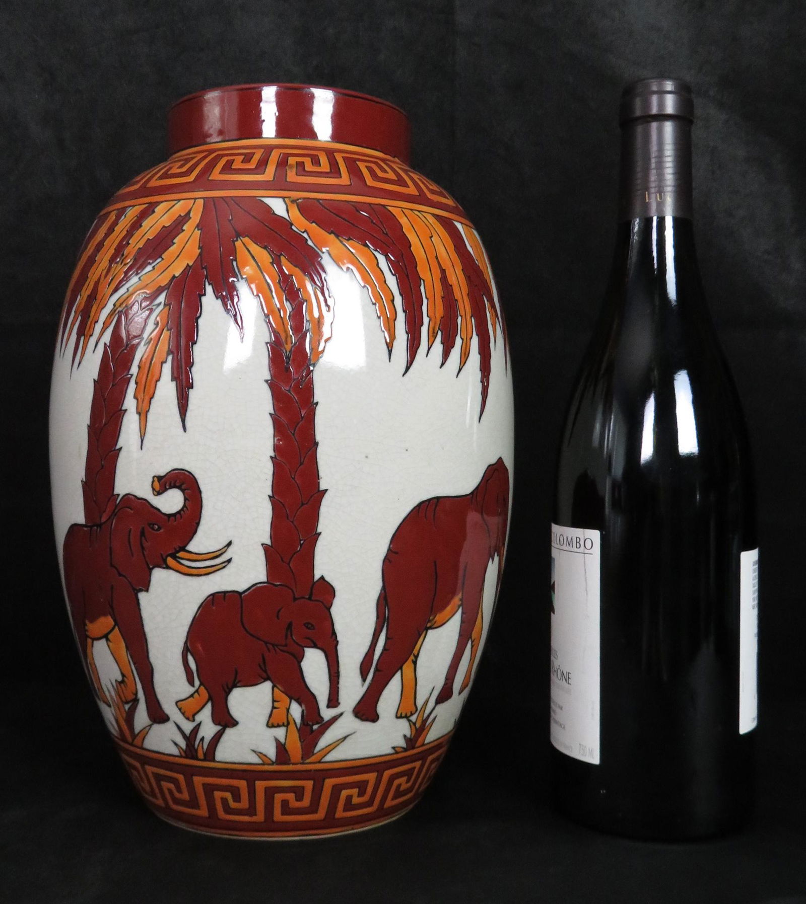 Boch Freres Style Deco Belgian Faience Elephant Vase: Location of Manufacture: Lalouviere, Belgium Dimensions: 11 1/4"(h) ; 7" maximum diameter Weight: 4 lbs. 6 oz. For your consideration is a stunning Belgian faience vase depicting a parade of elephants