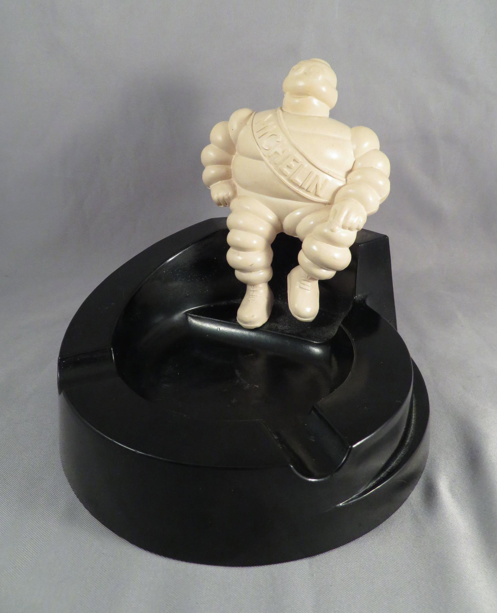 Vintage Bakelite Michelin Man Ashtray Made in England: Advertiser: Michelin Tires Location of Manufacture: England Period of Manufacture: 1st Half of 20th Century Dimensions: 5 3/4\"(d) x 5 3/8\"(w) x 4 7/8\"(h) Weight: 11 ounces For your consideration is