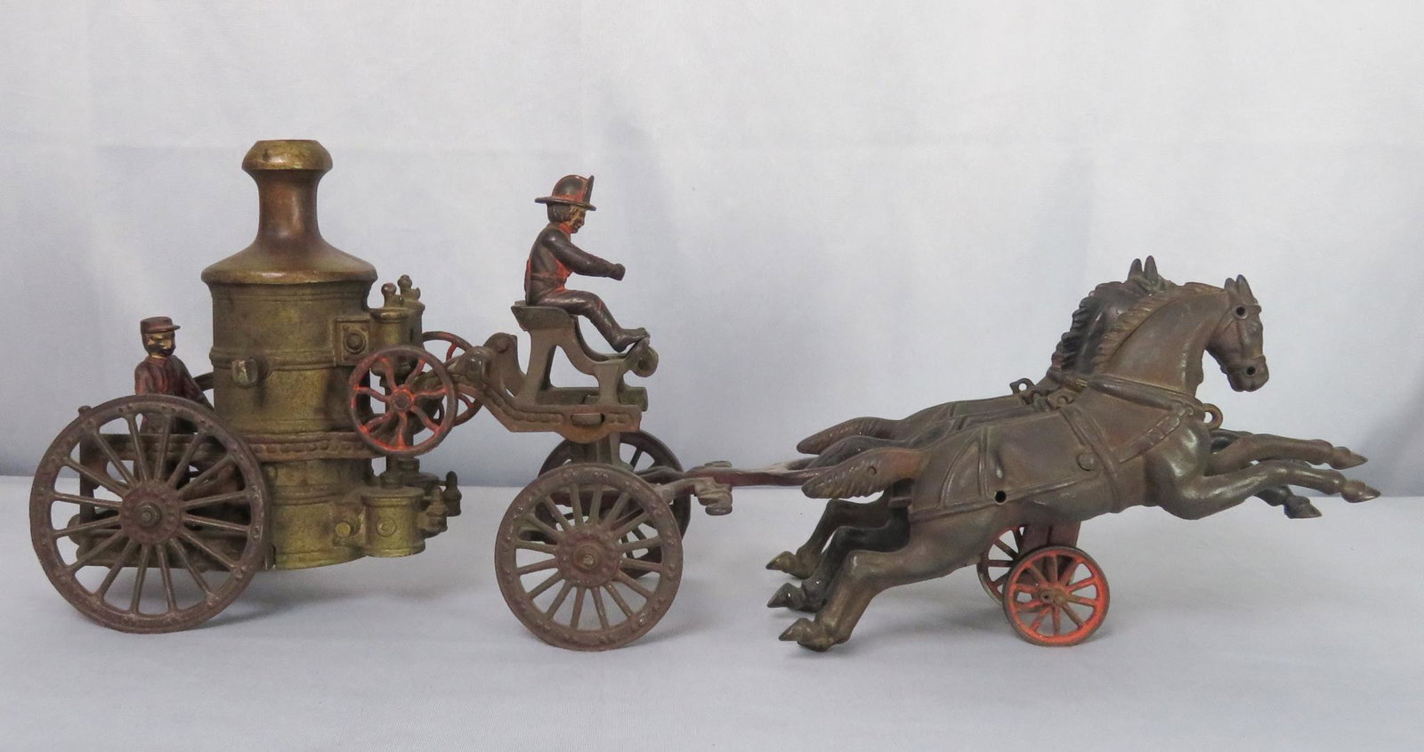Dent Toys Oversized Cast Iron Horse Drawn Fire Pumper: Toy Name: Fire Engine/Pump "No. 10" Manufacturer: Dent Hardware Company Location of Manufacture: Fullerton, Pennsylvania Period of Manufacture: 1st Quarter of 20th Century Dimensions: 22"(l) x 5 1/2"(
