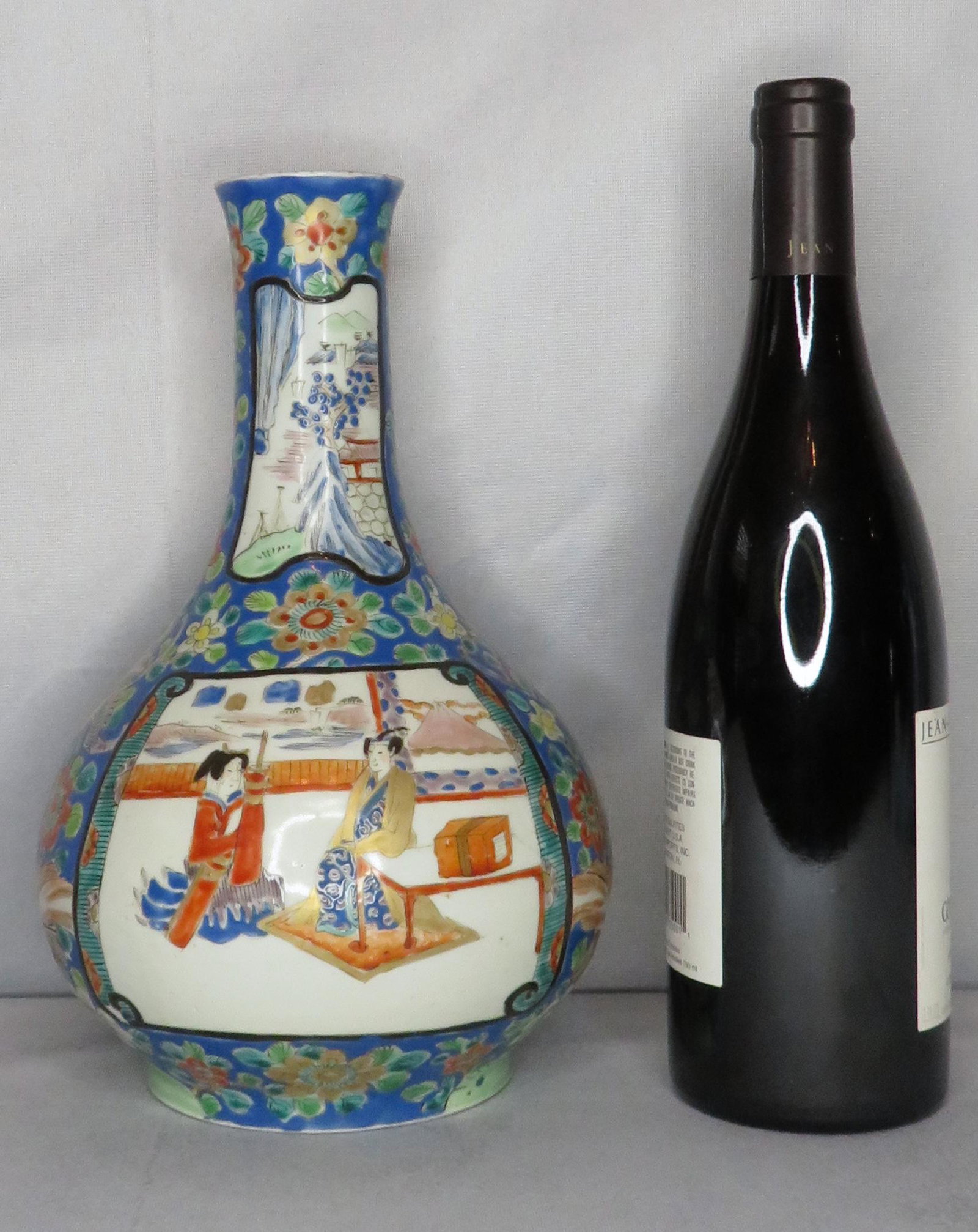 c1860 Japanese Hichozan Shinpo-sei Arita Porcelain Vase: Manufacturer: Hichozan Shinpo-sei Location of Manufacture: Mikawachi Kilns, Japan Period of Manufacture: late Edo (1603-1867) Decoration: Arita Dimensions: 10 1/2"(h) ; 6" diameter at widest point Wei