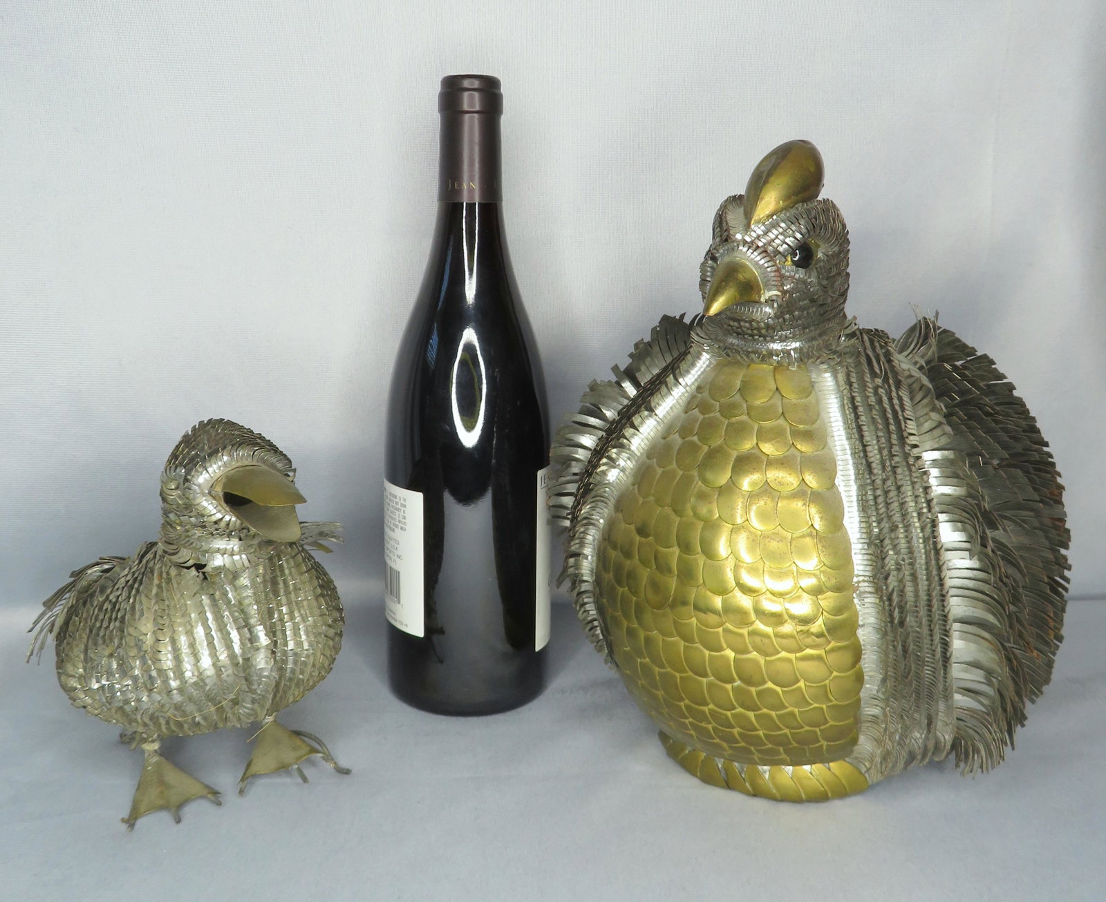 (2) Sergio Bustamante Tin & Brass Bird Sculptures: Manufacturer: Sergio Bustamante Location of Manufacture: Mexico Period of Manufacture: 1970's Dimensions of Duck: 8 1/2"(l) x 5"(w) x 6"(h) Dimensions of Pheasant: 10 1/2"(h) x 7"(d) x 7 1/2"(w) Weigh