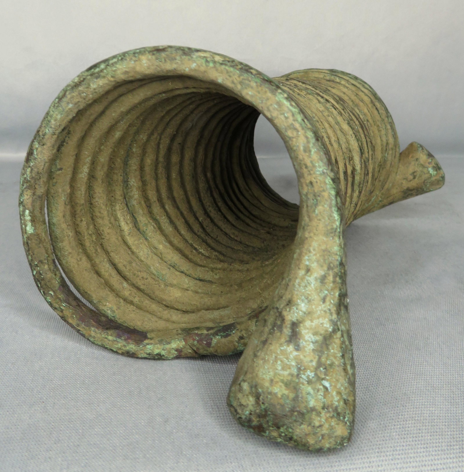 Early 20th Century Nigeria Igbo Coiled African Currency: Origin: Nigeria Tribal Affiliation: Igbo Period of Manufacture: Late 19th to Early 20th Century Dimensions: 10 1/2"(l) ; 4 1/2" diameter ; 20 coils Weight: 7 lbs. 2 oz. For your consideration is a Nig