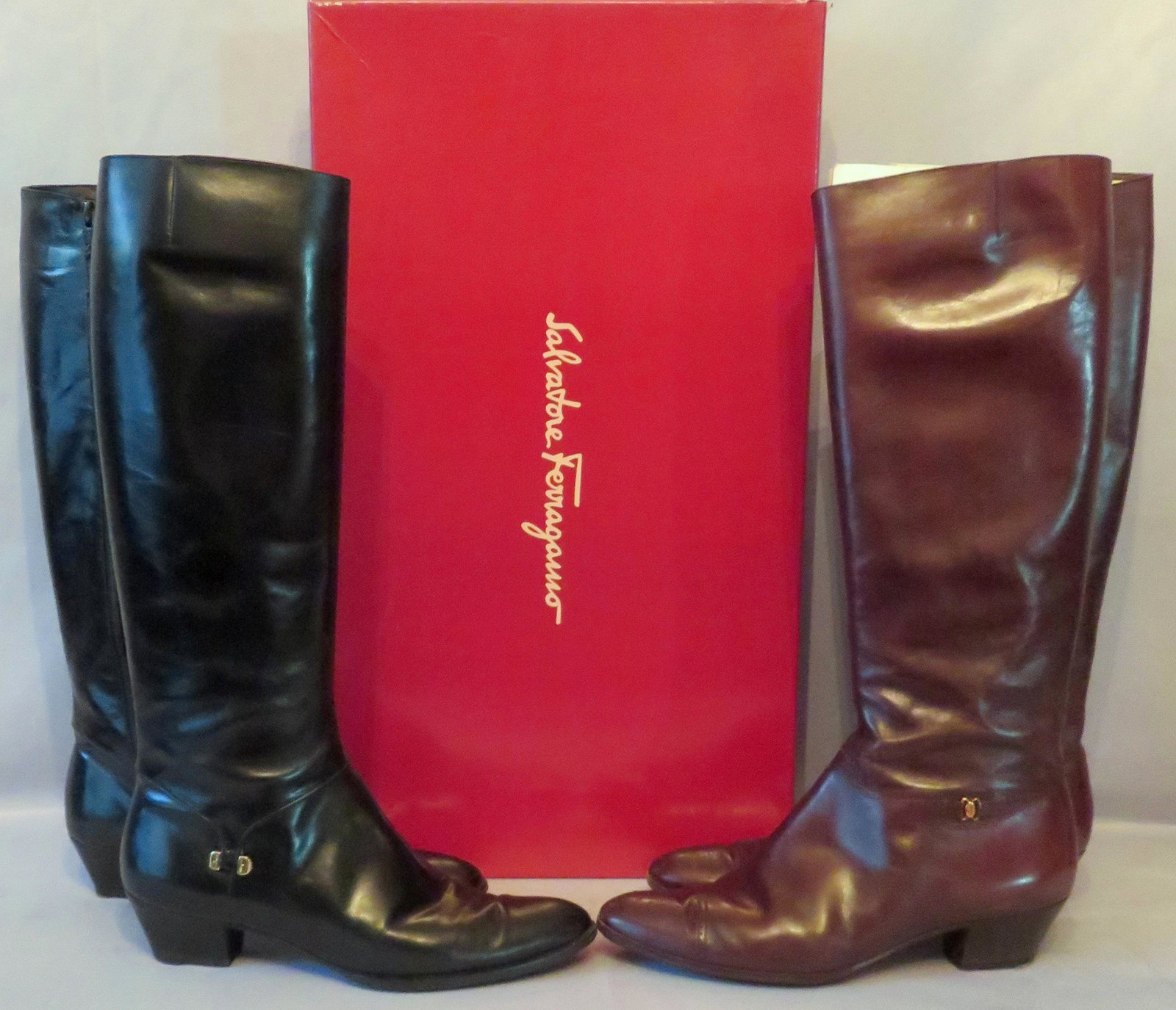 (2) Pair Salvatore Ferragamo Leather Zip Up Calf Boots: Manufacturer: Salvatore Ferragamo Size: 10 Weight (both): 7 lbs. 9 oz. For your consideration are (2) pairs of vintage/discontinued Salvatore Ferragamo leather zip-up calf boots. The leather on both p
