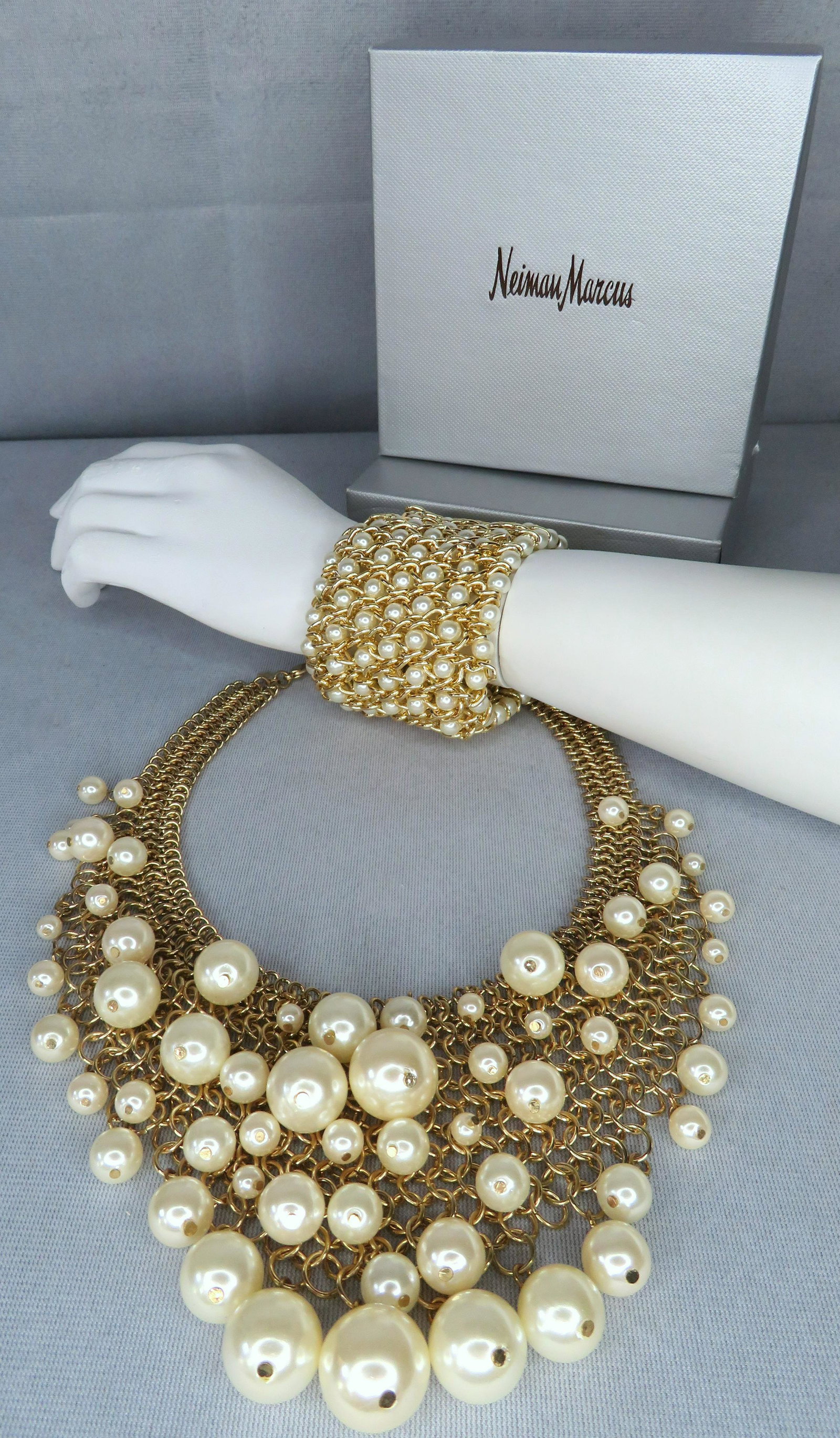 Kenneth Jay Lane Gold Mesh Pearl Bib Necklace Bracelet: Designer: Kenneth Jay Lane (KJL) Retailer: Neiman Marcus Total Necklace Length: 17" Length of Adjustable Portion of Chain: 3" Maximum Necklace Drop: 10 1/2" Bracelet Width: 2 1/4" For your considerati