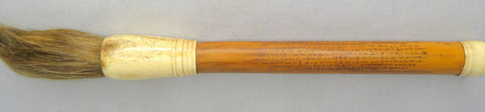 Chinese Horsehair Calligraphy Paint Brush w/Inscription: Location of Manufacture: China Period of Manufacture: Qing Dynasty / 19th Century Dimensions: 16 1/2"(l) ; 5" circumference Weight: 6 ounces For your consideration is a beautiful antique Chinese calli