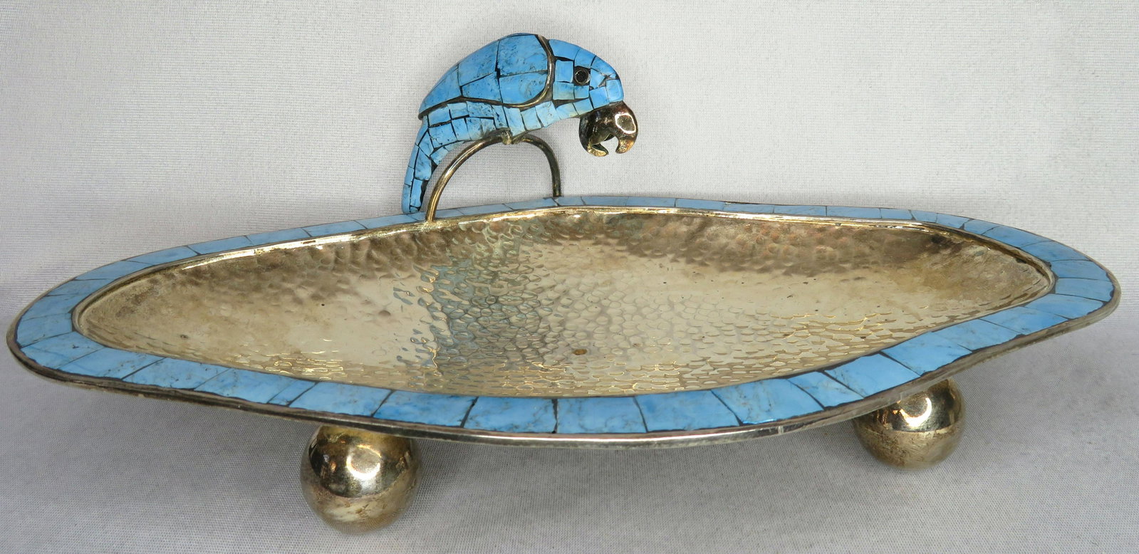 Los Castillos Style Turquoise Inlaid Silver Parrot Dish: Location of Manufacture: Mexico Period of Manufacture: Last Half 20th Century Dimensions: !4 1/2"(l) x 9"(w) x 5"(h) Weight: 1 lbs. 10 oz. For your consideration is a stunning turquoise inlaid silver 
