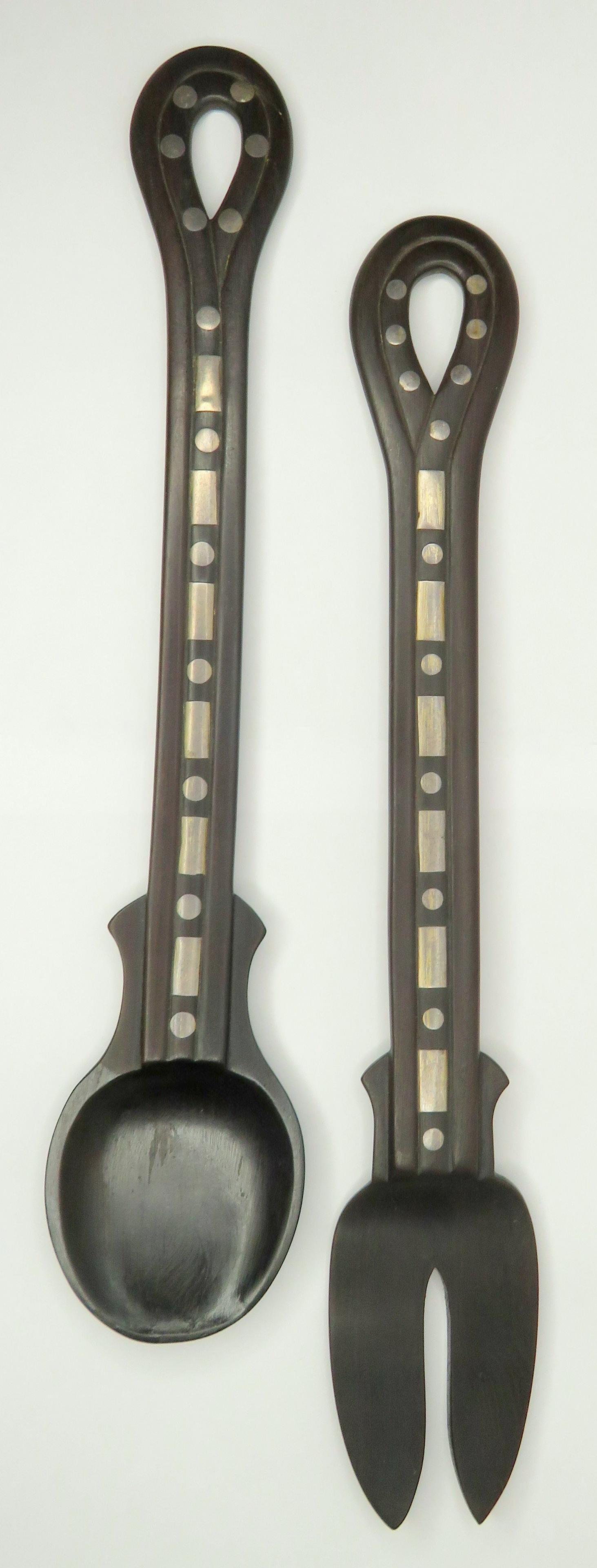 17" William Spratling Sterling Inlaid Ebony Serving Set: Designer: William Spratling Location of Manufacture: Taxco, Mexico Period of Manufacture: 1956-1962 Spoon Dimensions: 16 1/2"(l) ; 3 1/8" at widest point Fork Dimensions: 16 5/8"(l) ; 2 5/8" at widest