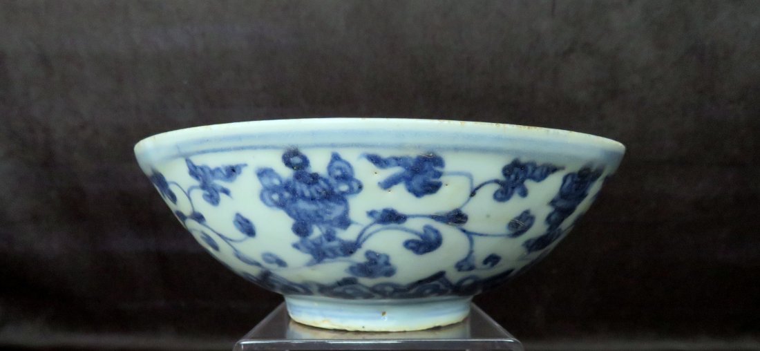 16th Century Chinese Ming Dynasty Porcelain Bowl: Location of Manufacture: China Period of Manufacture: Ming Dynasty (1368-1644), 16th Century Dimensions: 5 5/8" diameter at rim ; 2" in height ; 2 1/4" diameter at foot ; 1/4" foot height Weight: 176 