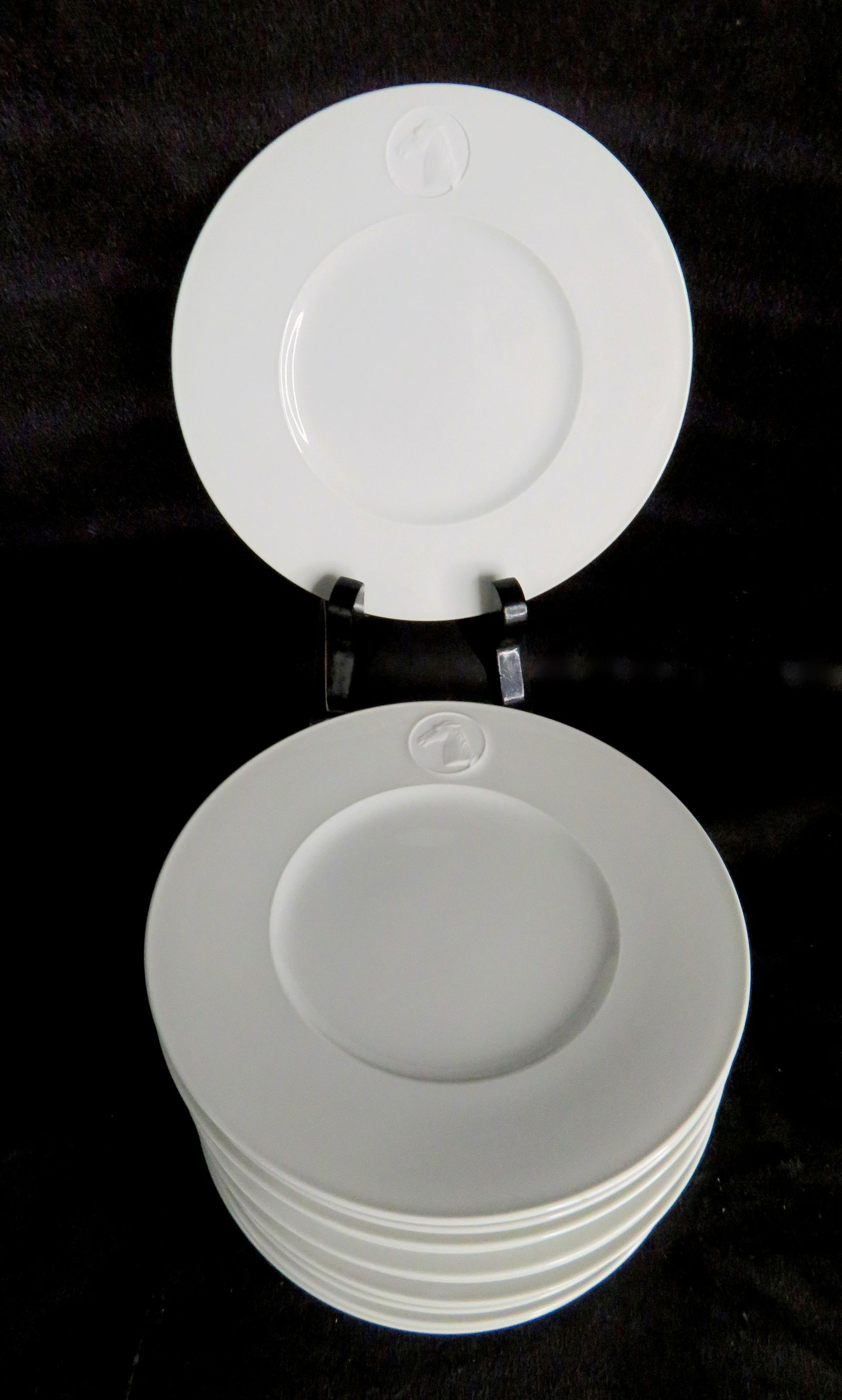 (12) KPM Berlin Arkadia White Equine Cameo Bread Plates: Manufacturer: Königliche Porzellan-Manufaktur Location of Manufacture: Berlin, Germany Design Date: 1938 Designer: Trude Petri & Siegmund Schütz Diameter: 6 3/16" Weight of Set: 4 lbs. 15 oz. For yo