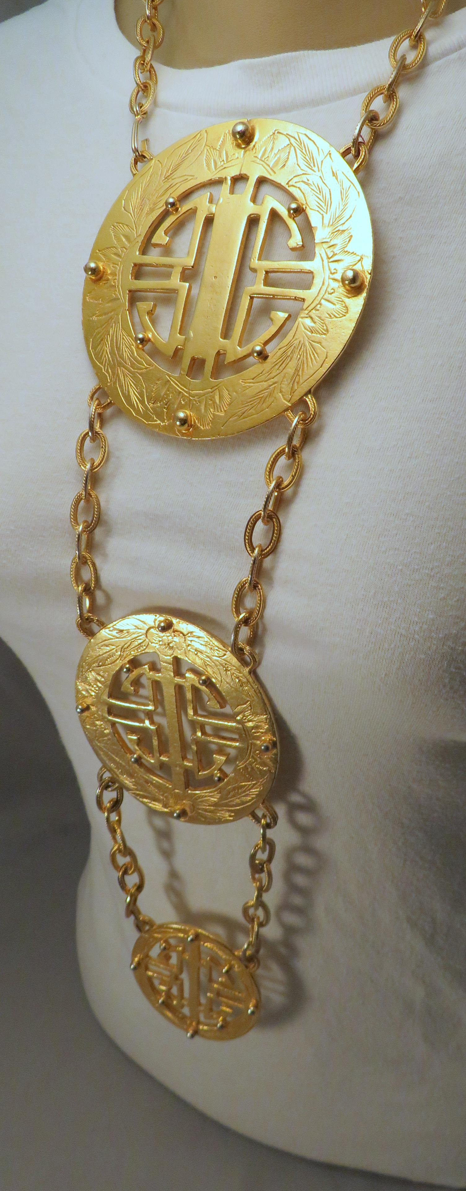 Massive 70s Alexis Kirk Chinoiserie Medallion Necklace: Designer: Alexis Kirk (1936-2010) Location of Manufacture: New York Neck Chain: 15"(l) Largest Medallion Diameter: 4" Middle Medallion Diameter: 3" Smallest Medallion Diameter: 2" Total Length of Neck
