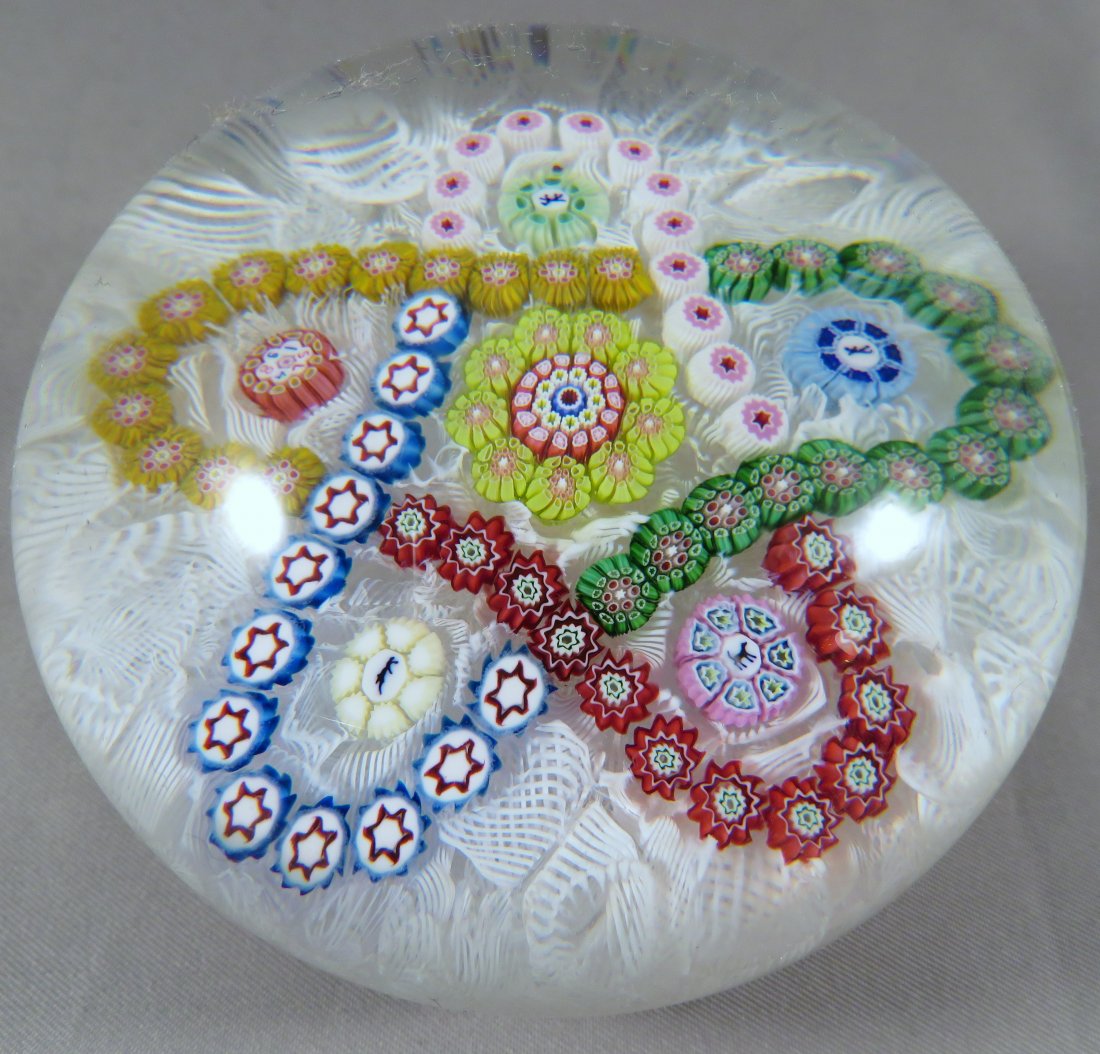 Custom Saint Louis Cane Star Paperweight for Farfalla: Manufacturer: Saint Louis Crystal / Cristal Saint Louis Location of Manufacture: Paris, France Retailer: Farfalla Paperweights (Germany) Dimensions: 2"(h) x 2 3/4" diameter Weight: 1 lbs. 5 oz. For yo