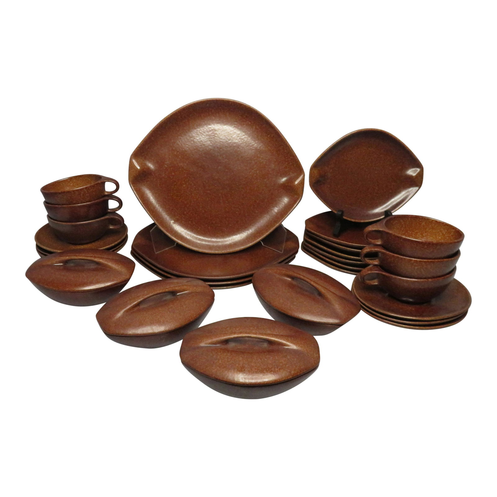 21 Piece Roseville Raymor Tablewaer by Ben Seibel c1952: Designer: Ben Seibel (1918-1985) Manufacturer: Roseville Pottery Pattern: Raymor Pattern Date: 1952-1954 Color: Autumn Borwn Dinner Plate Dimensions: 12"(l) Bread & Butter Plate Dimensions: 7 3/4"(l)