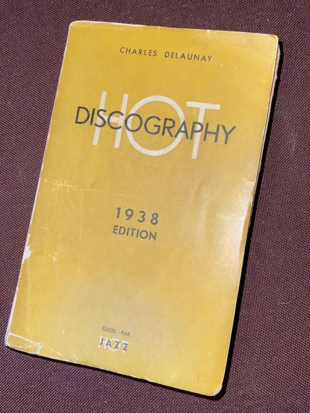 (JAZZ) Charles Delaunay. Inscribed book HOT Discography 1938, Paris: Hot Jazz:  Delaunay, Charles. HOT DISCOGRAPHY. 1938 Edition. Paris: Hot Jazz. (1938). Ephemeral French pulp paperback with mustard covers, vg, spine cr