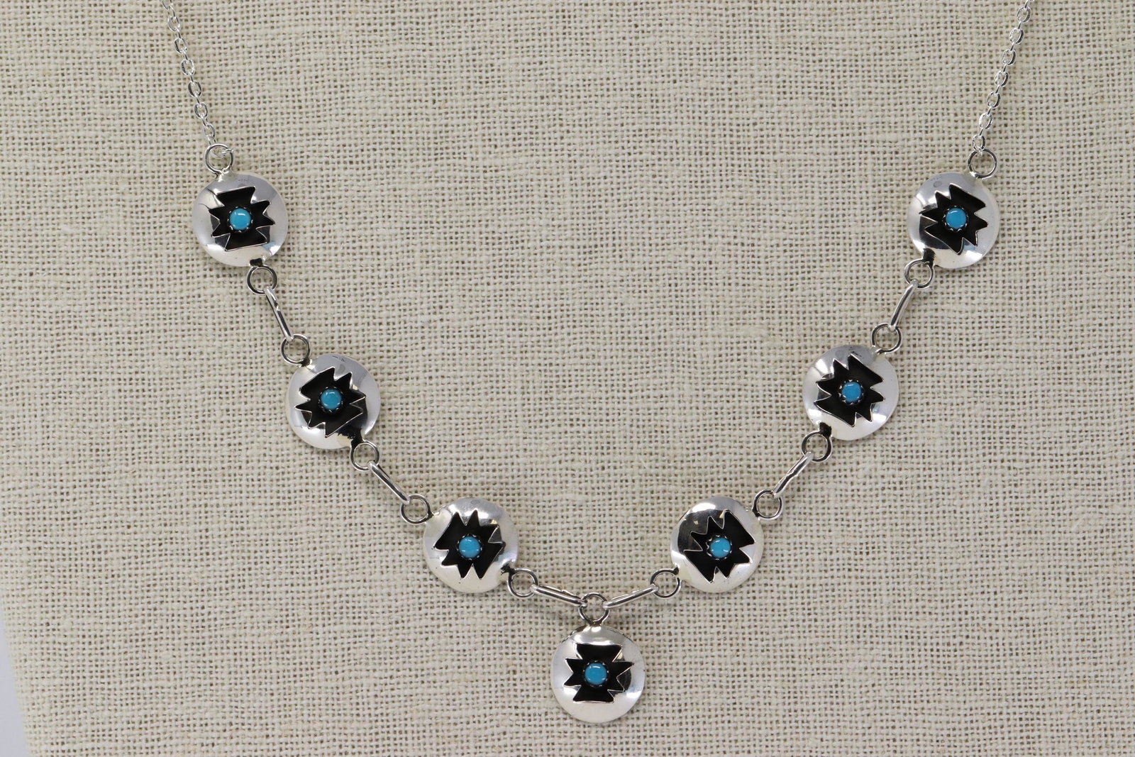 Navajo 7 round shadowbox Turquoise Necklace: This is a Silver Plated Navajo 7 round shadowbox Turquoise Necklace. Handcrafted by Navajo artisan David L. Morgan.