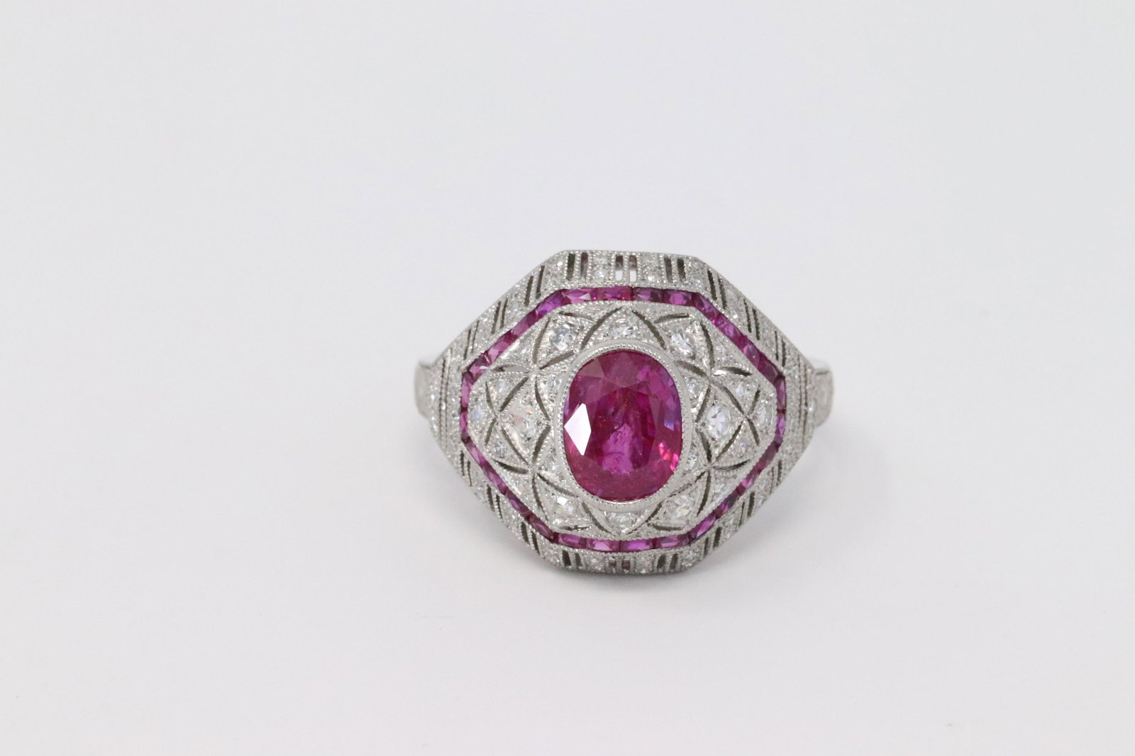Art Deco Burmese Ruby and Diamond Ring: This is a Art Deco Burmese Ruby and Diamond Platinum Ring. This Ring has a Burmese Ruby in the center That Weight 1.53.CT. Princess Ruby Cut weights 0.80.CT Diamond Total Weight is 0.28 Ct. Rig Size i
