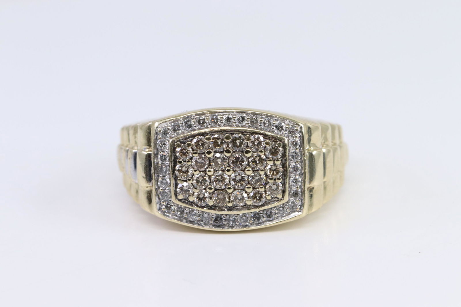 Men's Rolex Diamond Ring.: A Men's 14kt Rolex yellow gold diamond ring. The ring has a total of 55 round brilliant diamonds. The diamonds total weight: approx 0.80 cttw. Ring size is 10.00. Total ring weight is 6.50g.