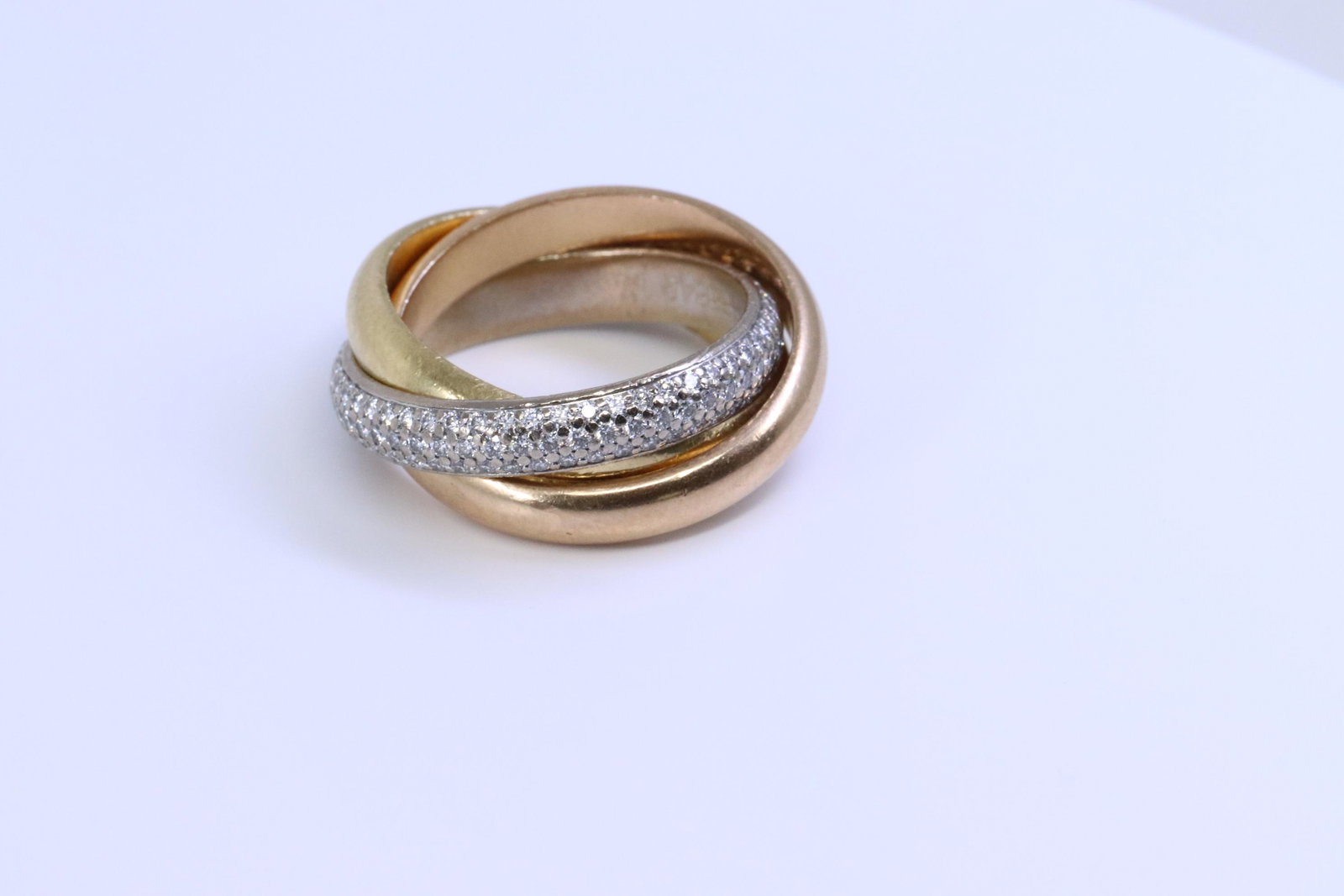 Cartier 18k Multi-color Gold Trinity De Cartier Pave: A authentic Cartier 18k Multi-color Gold Trinity De Cartier Pave Diamonds Ring Size 54. US ring size: 7.00. Ring width: about 4.00mm each. Total weight: 15.55 grams.