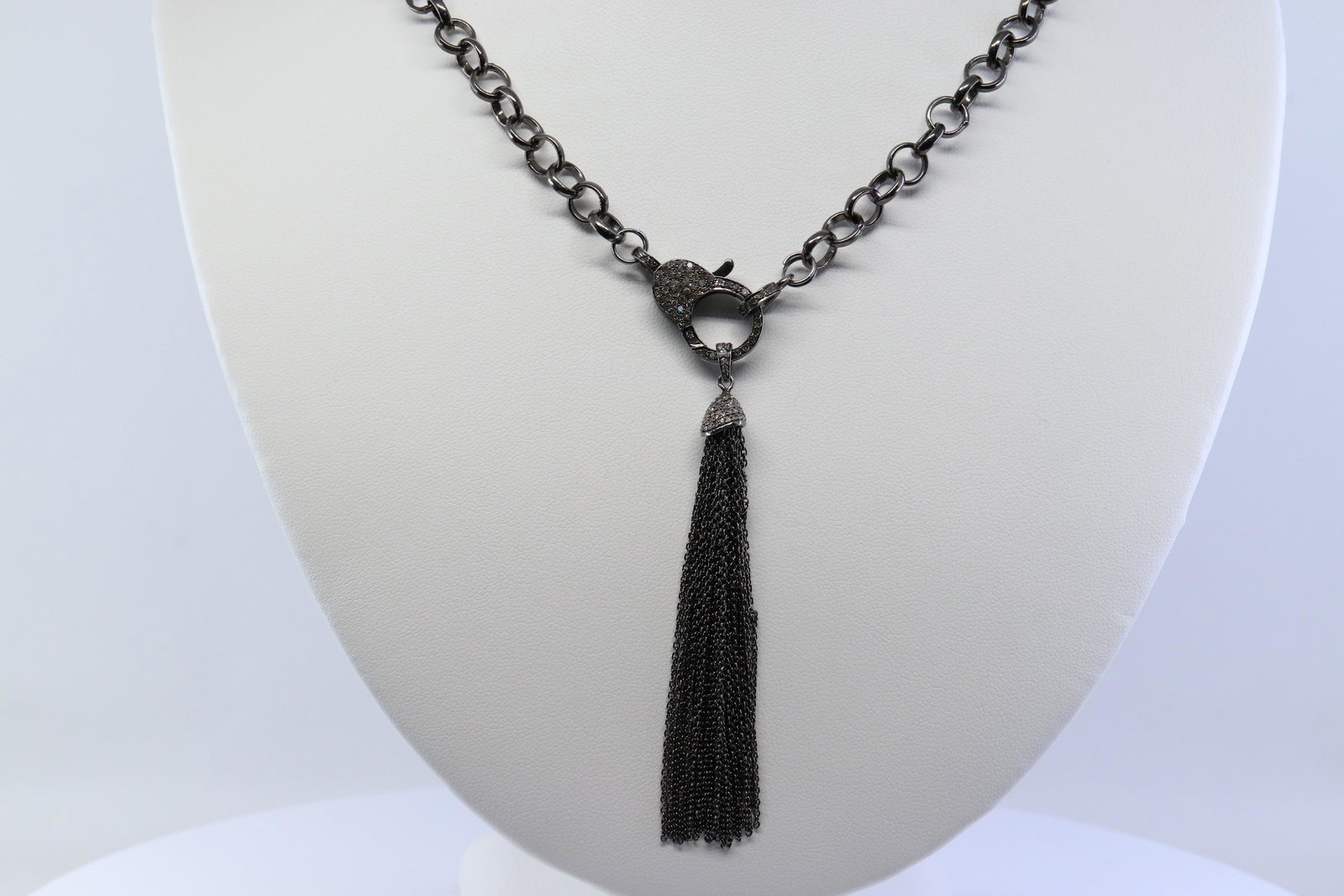 Diamond Necklace| Sterling Silver| Black Rodium: A ladies Black silver .925 diamond necklace. Necklace has a total diamond weight approx: 1.00cttw. Length: Either 36" or 16" folded. Total weight: 62.50 grams.