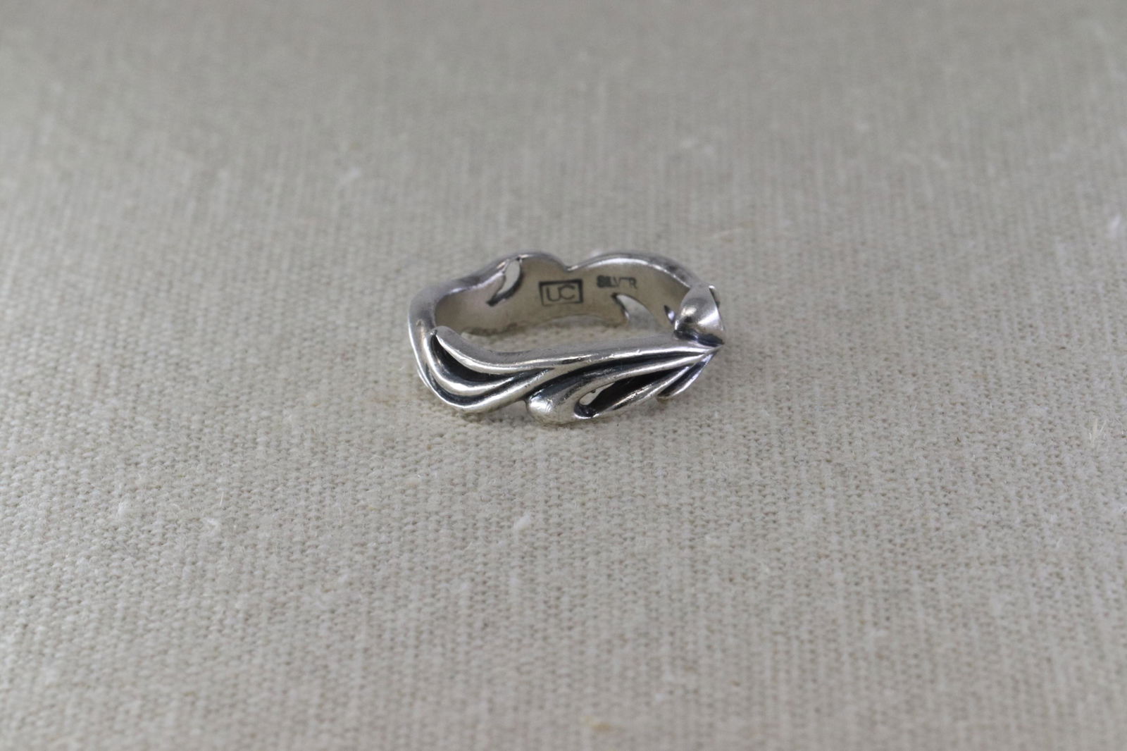 Vintage UC Sterling Silver Wavy Silver Ring: This is a Mens 925 Silver Vintage UC Sterling Silver Wavy Designed Band Ring. Ring size is 10. ring total weight is 7g.
