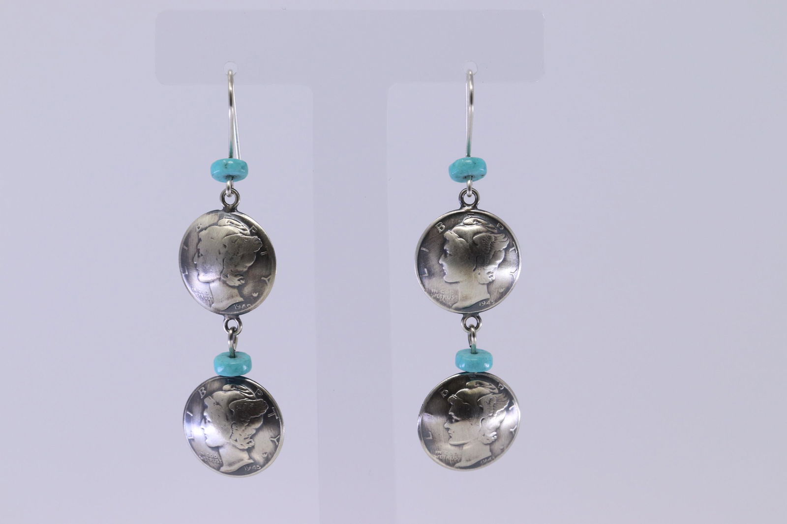 James McCabe Sterling Silver & Turquoise Liberty Coin: This is a James McCabe Sterling Silver & Turquoise Liberty Coin Dangle Earrings.