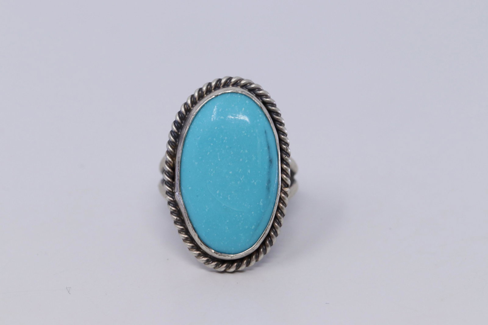 Kingman Turquoise Ring with Sterling Silver by Navajo: This is a Kingman Turquoise Ring with Sterling Silver by Navajo Eli Skeets. Ring size is 6.00