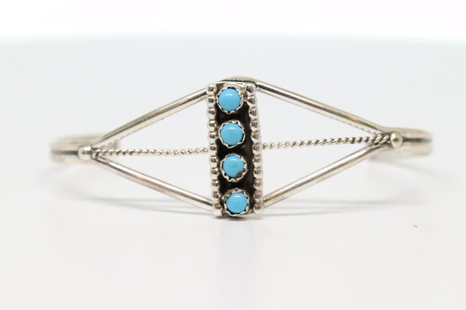 Native American Sterling Silver Navajo Bangle by:: Native American Navajo Handmade Sterling Silver Turquoise Bracelet -Janice. Measures: 6.00"x1.00".