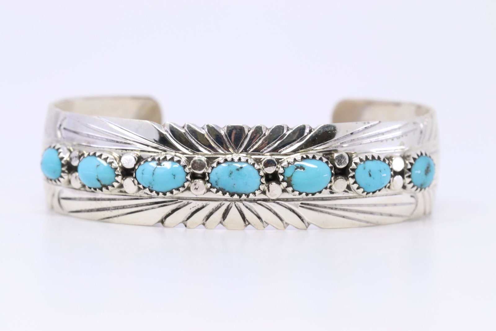 Native American Navajo Sterling Silver Turquoise: This is a Native American Navajo Sterling Silver Turquoise Bracelet By Julia Slinkey. Bracelet size is 6.00.