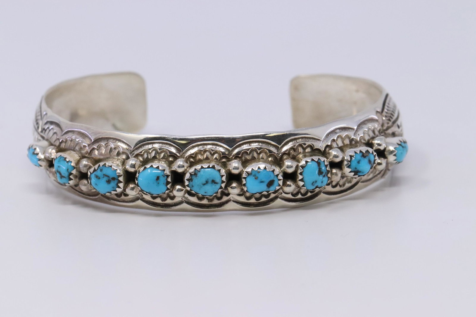 Native American Navajo Handmade Turquoise Bracelet By: This is a Native American Navajo Handmade Turquoise Bracelet By Grace Silver