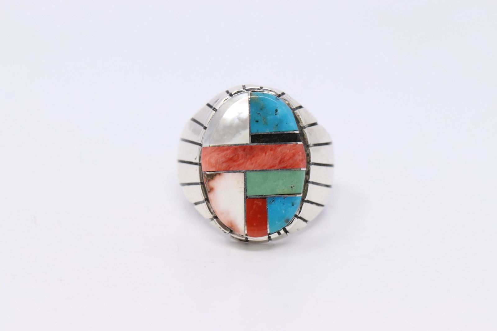 Native American Navajo Handmade Sterling Silver: This is a Native American Navajo Handmade Sterling Silver Multi-Color Ring By Ray Jack. Ring size is 9.00.