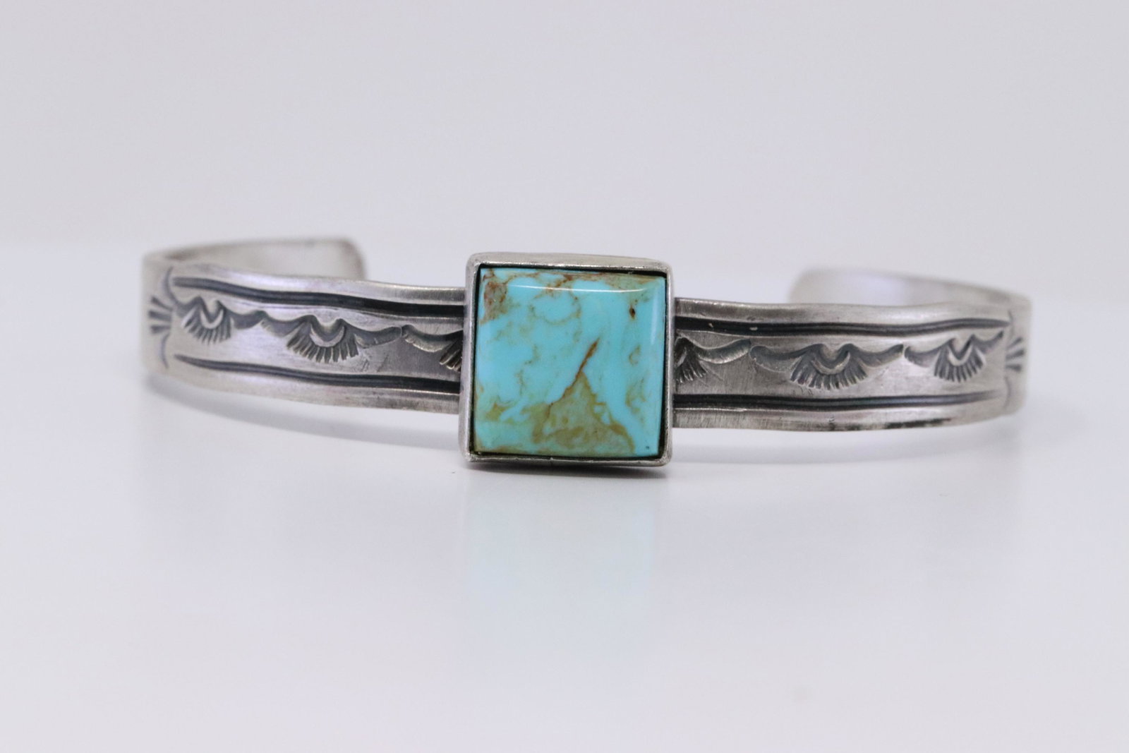 Native American Navajo Handmade Kingman Turquoise: This is a Native American Navajo Handmade Kingman Turquoise Sterling Bracelet By Rick Inriquez