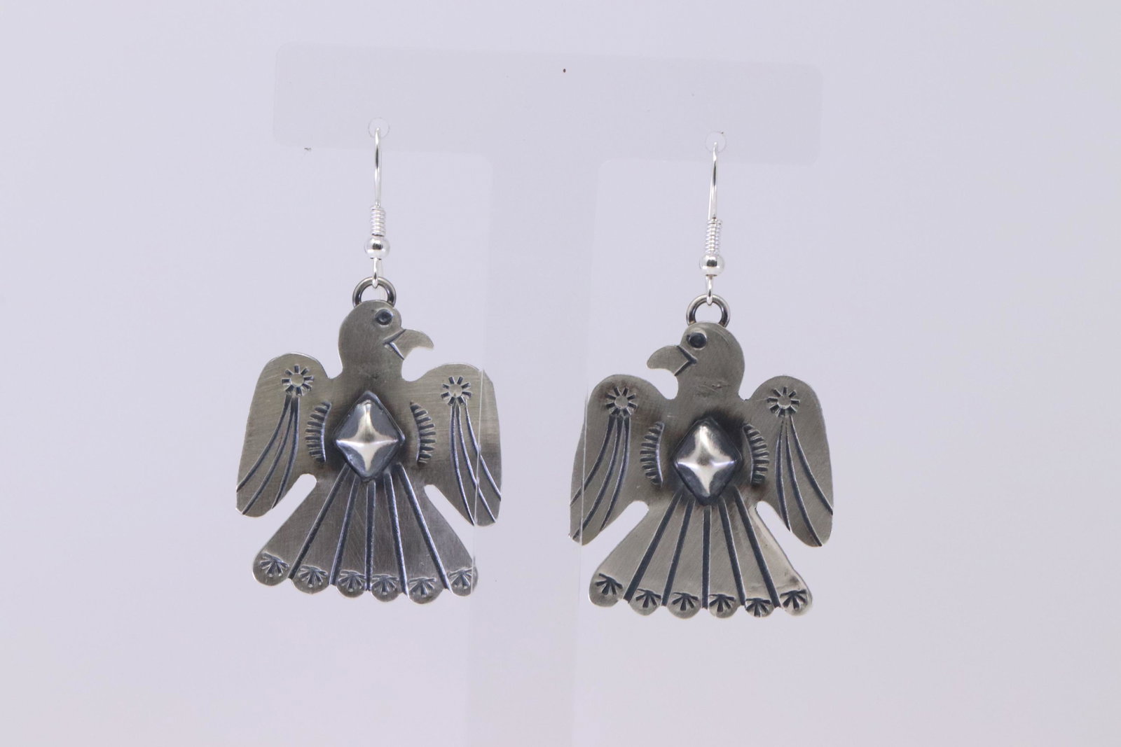 Native American Navajo Handmade Sterling Silver: This is a Native American Navajo Handmade Sterling Silver Thunderbirds Earrings by Tim Yazzie.