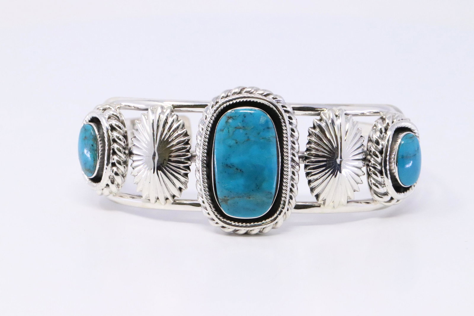 Native American Navajo Handmade Sterling Silver: This is a Native American Navajo Handmade Sterling Silver Turquoise Bracelet by Daniel Benally. Bracelet Measurement inside is 5.50in