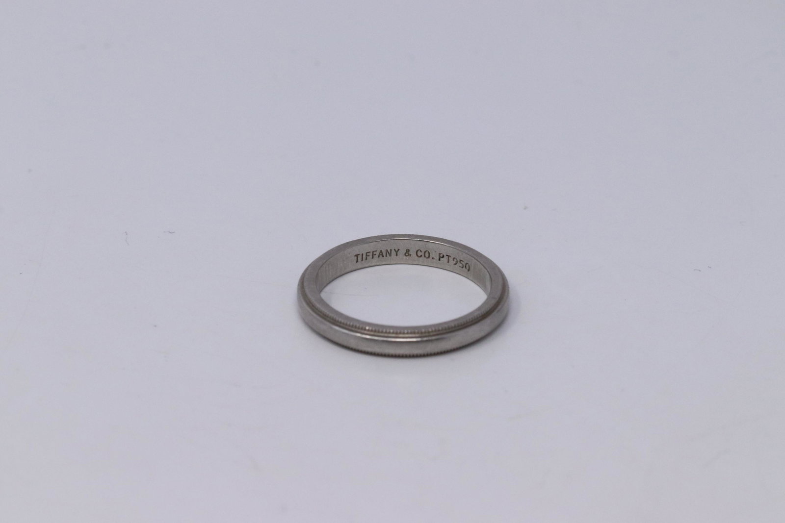 TIFFANY & CO PT950 Band: TIFFANY & CO PT950 Platinum Band. Ring size 6 2/4. Total weight 5.4 grams.