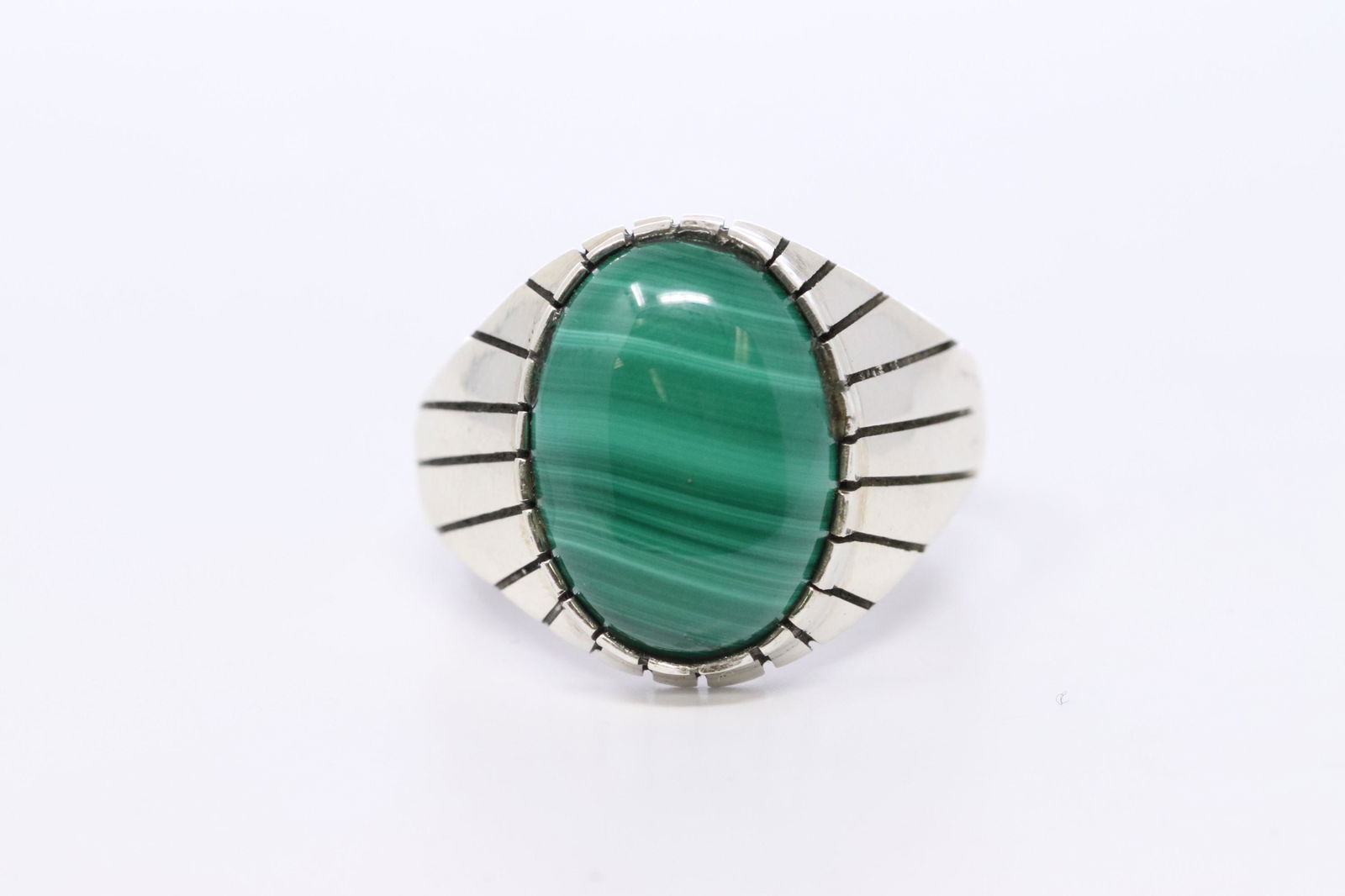 Native American Navajo Handmade Sterling Silver: This is a Native American Navajo Handmade Sterling Silver Malachite Ring By Ray Jack. Ring size is 15.00.