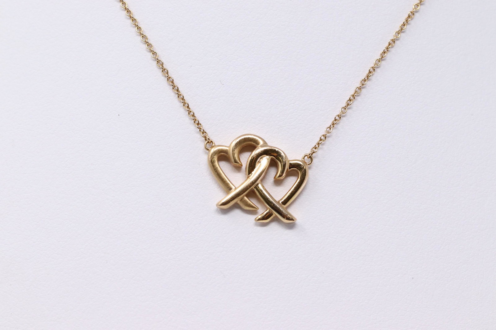 Tiffany & Co Paloma Picasso Loving Heart Interlocking: Tiffany & Co Paloma Picasso Loving Heart Interlocking Necklace. Measurment 18". Total weight 4.9 grams