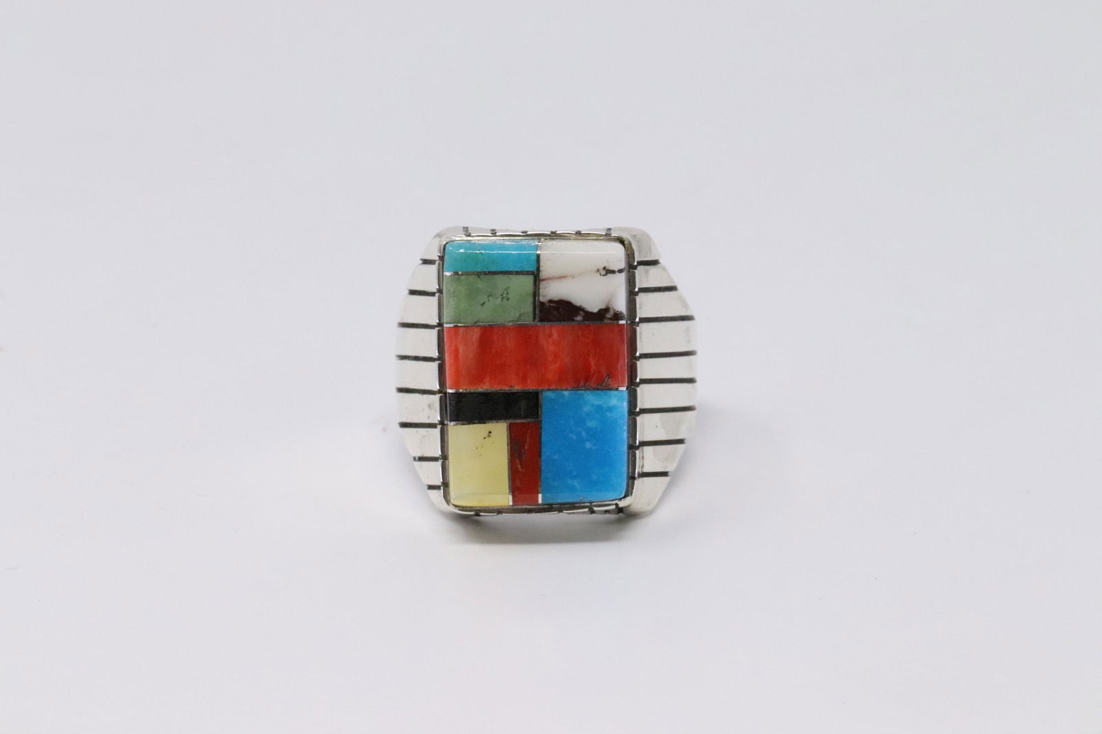 Native American Navajo Handmade Sterling Silver: This is a Native American Navajo Handmade Sterling Silver Multi-Color Inlay Ring by Ray Jack. Ring size is 10.50