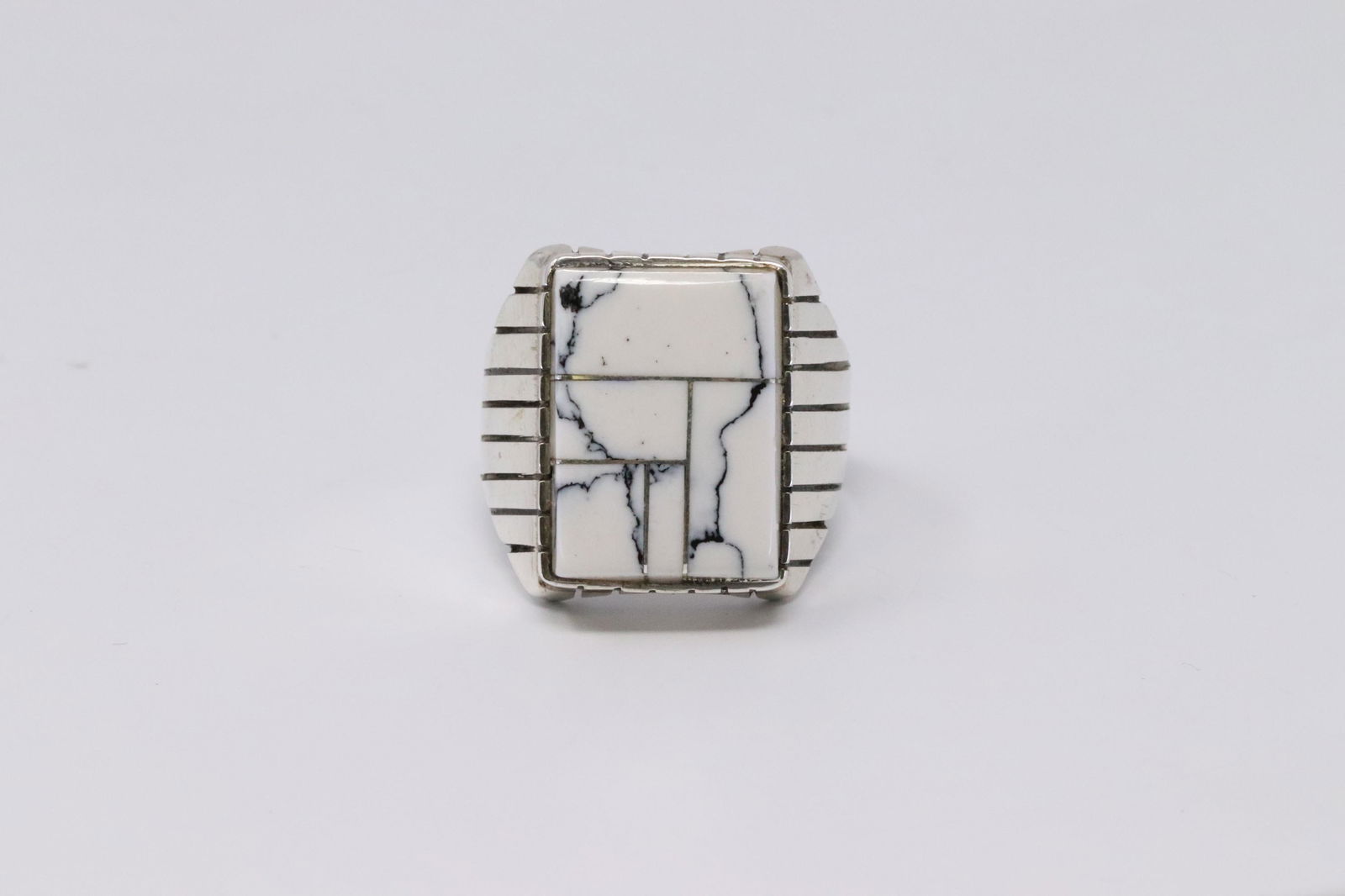 Native American Navajo Handmade Sterling Silver: This is a Native American Navajo Handmade Sterling Silver Synthetic White Buffalo Inlay Ring by Ray Jack. Ring size is 9.50.