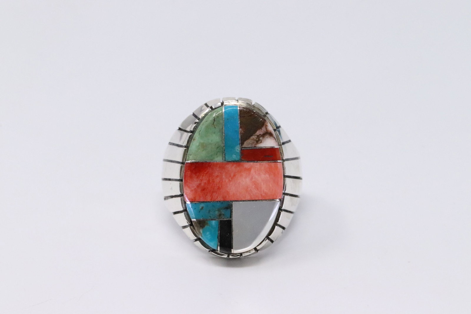Native American Navajo Handmade Sterling Silver: This is a Native American Navajo Handmade Sterling Silver Multi-Color Inlay Ring by Ray Jack. Ring size is 9.75