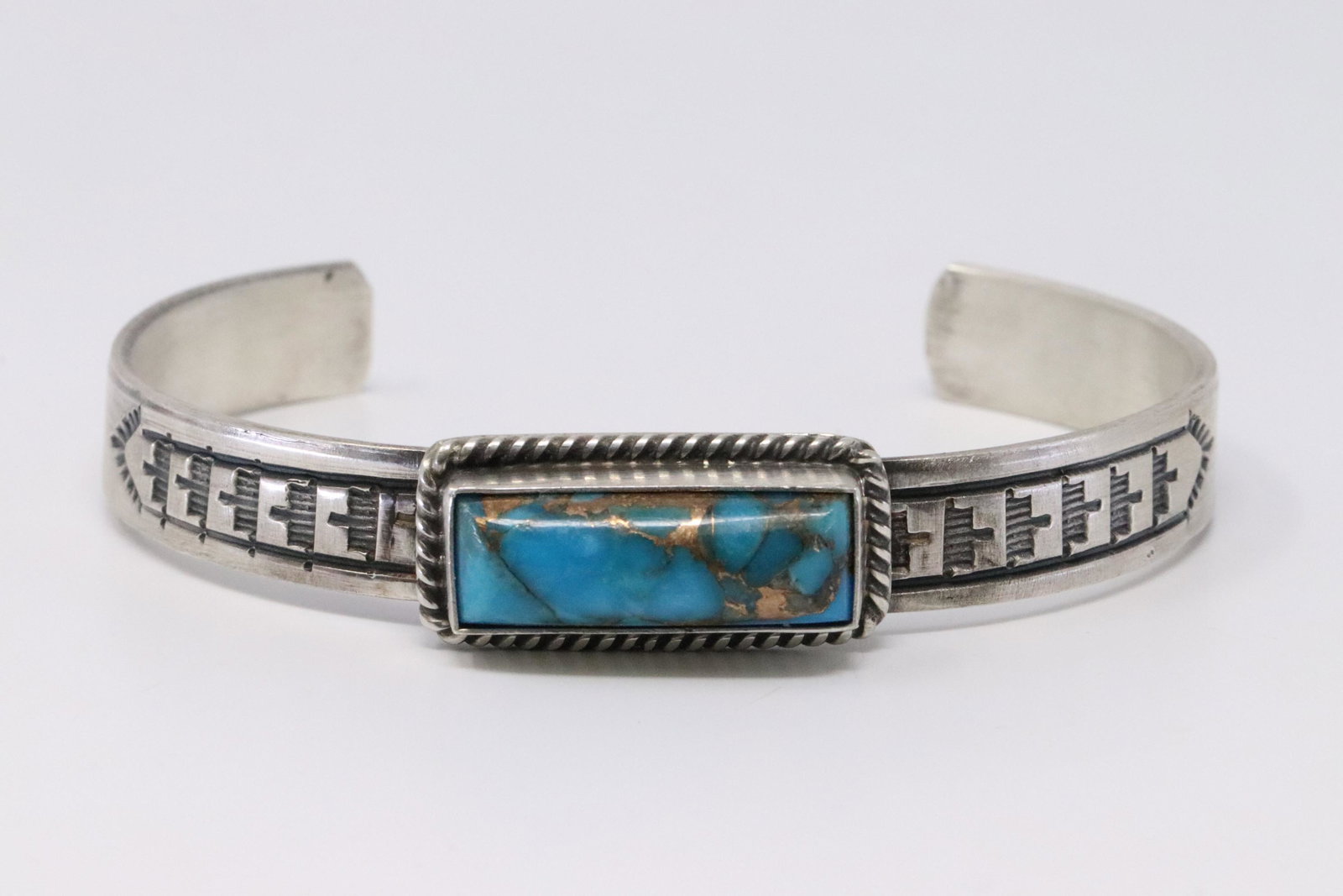Native American Navajo Handmade Sterling Silver: This is a Native American Navajo Handmade Sterling Silver Turquoise Bracelet by Rick Enriquez.