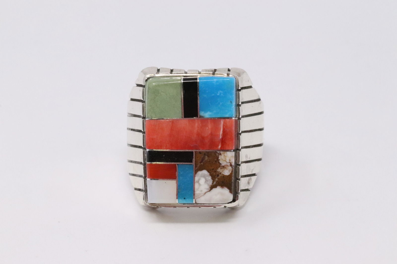 Native American Navajo Handmade Sterling Silver: This is a Native American Navajo Handmade Sterling Silver Multi-Color Inlay Ring by Ray Jack. Ring size is 8.50