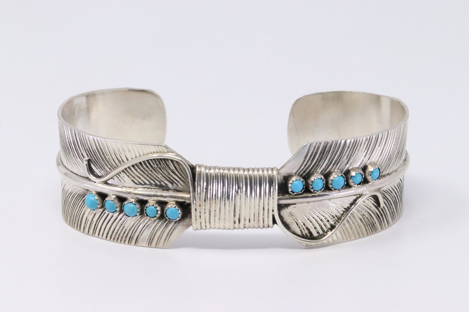 Native American Navajo Handmade Sterling Silver Feather: This is a Native American Navajo Handmade Sterling Silver Feather Turquoise Bracelet by Byron Begay.