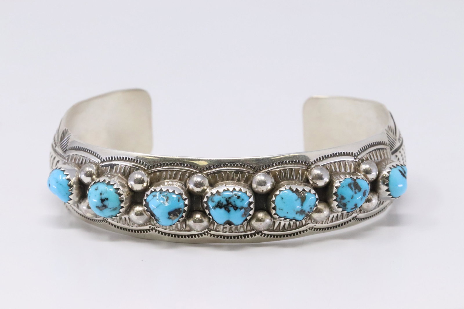 Native American Navajo Handmade Sterling Silver: This is a Native American Navajo Handmade Sterling Silver Turquoise Bracelet by Grace Silver.