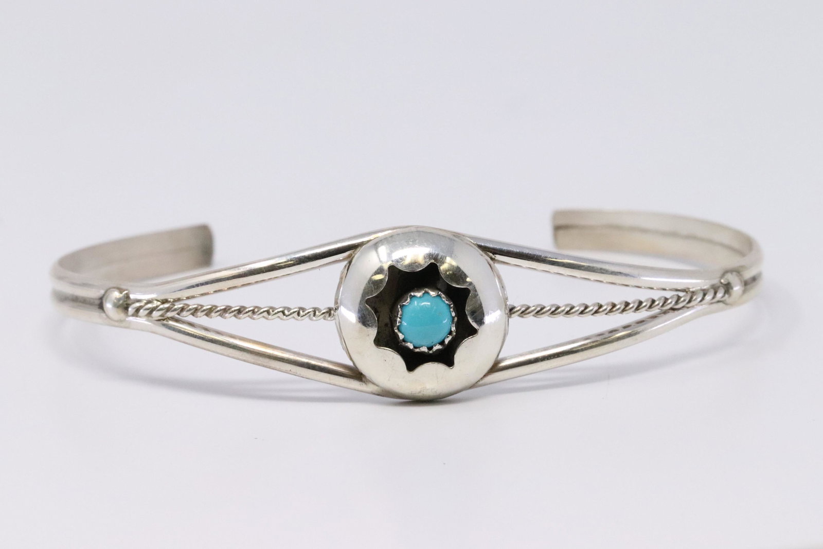 Native American Navajo Handmade Sterling Silver: This is a Native American Navajo Handmade Sterling Silver Turquoise Shadowbox Bracelet by Janice Spencer.